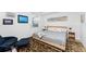 Spacious bedroom with a king-size bed and sitting area at 14151 Heritage Landing Blvd # 1021, Punta Gorda, FL 33955