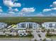 Aerial view of condo building and surrounding parking lot, shows location of unit at 14151 Heritage Landing Blvd # 1021, Punta Gorda, FL 33955