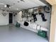 Organized garage storage with a kayak hanging from the ceiling at 201 W Tarpon Nw Blvd, Port Charlotte, FL 33952