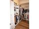 Large walk-in closet with ample shelving and hanging space at 2620 Tarpon Cove Dr # 311, Punta Gorda, FL 33950