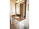 Bathroom with single vanity and granite countertop at 2620 Tarpon Cove Dr # 311, Punta Gorda, FL 33950