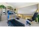 Upstairs home gym with treadmill and weight bench at 3736 Bordeaux Dr, Punta Gorda, FL 33950
