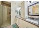 Elegant bathroom with granite countertops and double sinks at 632 Rose Apple Cir, Port Charlotte, FL 33954