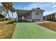 Charming home featuring a carport and well-maintained landscaping at 6450 Floral Ct, North Port, FL 34287