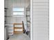 Small storage room with shelving for tools and supplies at 6450 Floral Ct, North Port, FL 34287