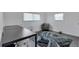Home office featuring two desks, chairs, and an area rug at 6450 Floral Ct, North Port, FL 34287