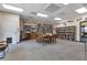 Community library with bookshelves and seating area at 6450 Floral Ct, North Port, FL 34287