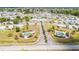 Community entrance with landscaping and fountains at 6450 Floral Ct, North Port, FL 34287