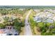 Aerial view of community with homes and roads at 6450 Floral Ct, North Port, FL 34287