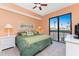 Bedroom with king-size bed and access to balcony at 88 Vivante Blvd # 8845/405, Punta Gorda, FL 33950