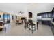 Modern kitchen with dark wood cabinets, granite counters and stainless steel appliances at 88 Vivante Blvd # 8845/405, Punta Gorda, FL 33950