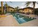 Relaxing resort-style pool with lounge chairs at 88 Vivante Blvd # 8845/405, Punta Gorda, FL 33950