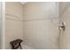 Walk-in shower with tiled walls and a convenient seat at 88 Vivante Blvd # 8845/405, Punta Gorda, FL 33950
