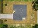 Aerial view of a single-Gathering home and yard at 1430 Nora Ln, North Port, FL 34286
