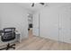 Home office with desk and view into living area at 1497 Nordendale Blvd, North Port, FL 34288