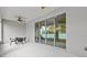 Covered patio with sliding glass doors leading to the backyard at 1497 Nordendale Blvd, North Port, FL 34288