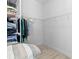 Spacious walk-in closet with shelving and hanging rods at 1497 Nordendale Blvd, North Port, FL 34288