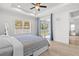 Main bedroom with sliding glass doors to a private patio, and ceiling fan at 1497 Nordendale Blvd, North Port, FL 34288