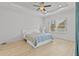 Bright bedroom with a queen-size bed and access to a private patio at 1497 Nordendale Blvd, North Port, FL 34288