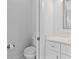 Clean bathroom with white vanity and toilet at 1497 Nordendale Blvd, North Port, FL 34288