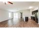 Open concept living space featuring a kitchen island and vinyl plank flooring at 248 Ravenswood Blvd, Port Charlotte, FL 33954