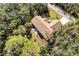 Aerial view showcasing home and surrounding trees at 2794 Parlay Ln, North Port, FL 34286