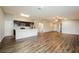 Kitchen with island, stainless steel appliances, and dark brown cabinets at 377 Avella St, Port Charlotte, FL 33954