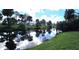 Scenic view of a canal with tree reflections at 416 Torrington St, Port Charlotte, FL 33954