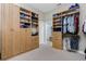 Large closet with built-in shelves and drawers at 4201 Eagle Nest Ct, Port Charlotte, FL 33948