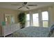 Bedroom with water view, dresser, and bed at 4410 Warren Ave # 101, Port Charlotte, FL 33953