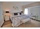 Spacious main bedroom with a king-size bed and ensuite bathroom at 5255 Drew Rd, Venice, FL 34293