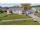 Aerial view of a single-story home with a gray exterior at 8170 Lombra Ave, North Port, FL 34287