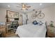 Bedroom with a queen bed, workspace, and ceiling fan at 1230 Swan Ct, Punta Gorda, FL 33950