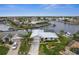 Waterfront home with canal access, lush landscaping, and a two-car garage at 1230 Swan Ct, Punta Gorda, FL 33950