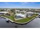 Waterfront property with private dock and surrounding homes at 1230 Swan Ct, Punta Gorda, FL 33950