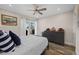 Guest bedroom with water views and built-in dresser at 1230 Swan Ct, Punta Gorda, FL 33950
