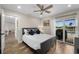 Bright guest bedroom with sliding doors to lanai at 1230 Swan Ct, Punta Gorda, FL 33950