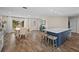 Bright dining room with a kitchen island and hardwood floors at 1230 Swan Ct, Punta Gorda, FL 33950