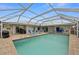 Inviting screened pool with plenty of space for lounging at 1230 Swan Ct, Punta Gorda, FL 33950
