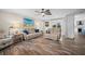 Open living room with comfortable seating and views of the canal at 1230 Swan Ct, Punta Gorda, FL 33950