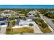 Waterfront home with fenced backyard, screened lanai, and a metal roof at 170 Chelsea Nw Ct, Port Charlotte, FL 33952