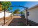 Spacious backyard with a pergola and white fence at 170 Chelsea Nw Ct, Port Charlotte, FL 33952