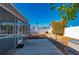 Backyard with covered patio, pool, white fence, and landscaping at 170 Chelsea Nw Ct, Port Charlotte, FL 33952