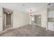Dining room with chandelier and view to backyard at 170 Chelsea Nw Ct, Port Charlotte, FL 33952