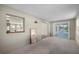 Dining space with sliding glass doors leading to the pool and a serving hatch to the kitchen at 170 Chelsea Nw Ct, Port Charlotte, FL 33952