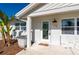A detailed view of the front door with decorative accents at 170 Chelsea Nw Ct, Port Charlotte, FL 33952