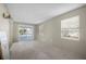 Bright living room with sliding glass doors leading to the pool at 170 Chelsea Nw Ct, Port Charlotte, FL 33952