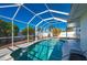 Backyard pool with a screen enclosure at 170 Chelsea Nw Ct, Port Charlotte, FL 33952