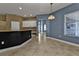 Bright kitchen area with tiled floors and large windows at 17152 Wintergarden Ave, Port Charlotte, FL 33948