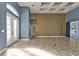 Open living area with large front door, tile floors, and neutral paint at 17152 Wintergarden Ave, Port Charlotte, FL 33948